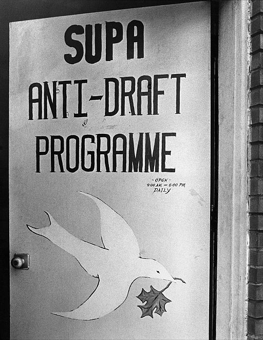 Poster that reads 'SUPA ANTI-DRAFT PROGRAMME open 9:00AM - 6:00PM daily' with an illustration of a dove holding a leaf in its mouth