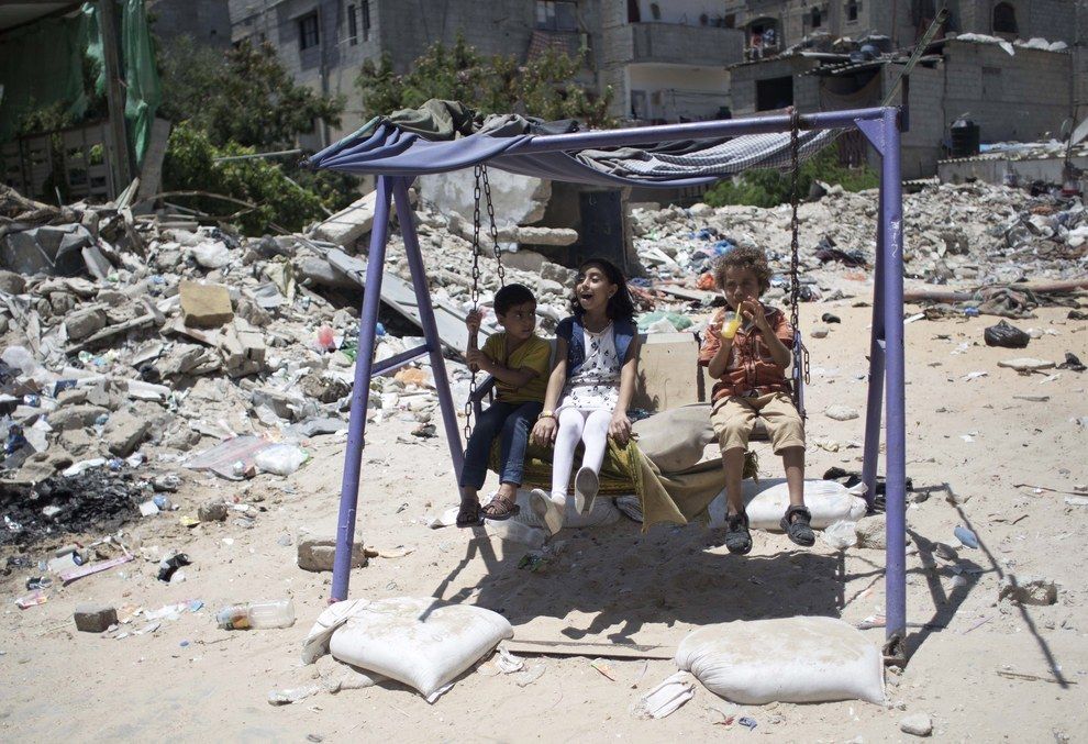 Children on swing in Gaza.